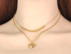 Collar doble bolitas corazón
