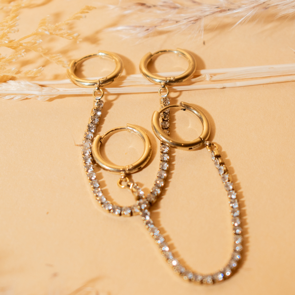 Aretes colgantes con diamantes